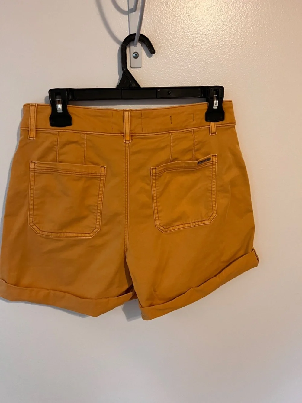 White House Black Market 4 ½” mid rise shorts - Yellow - Size 4